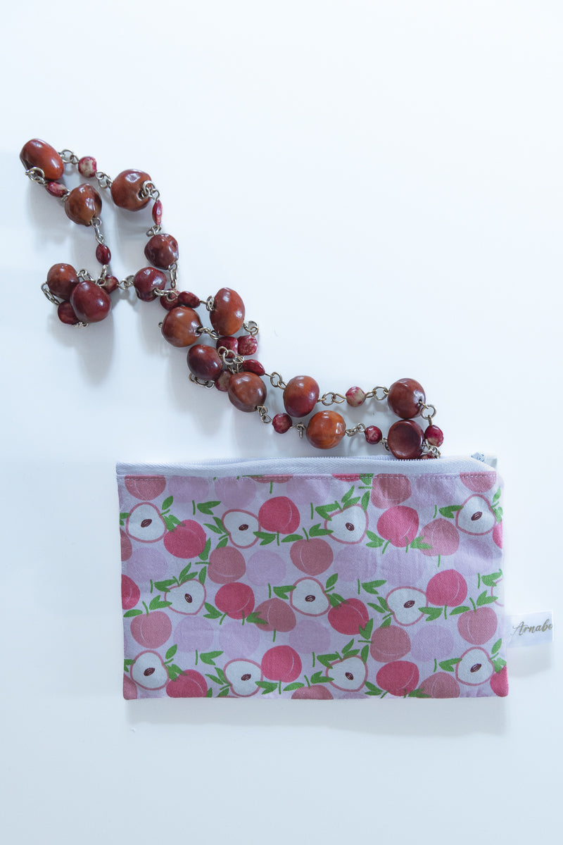 Astuccio rosa con pesche