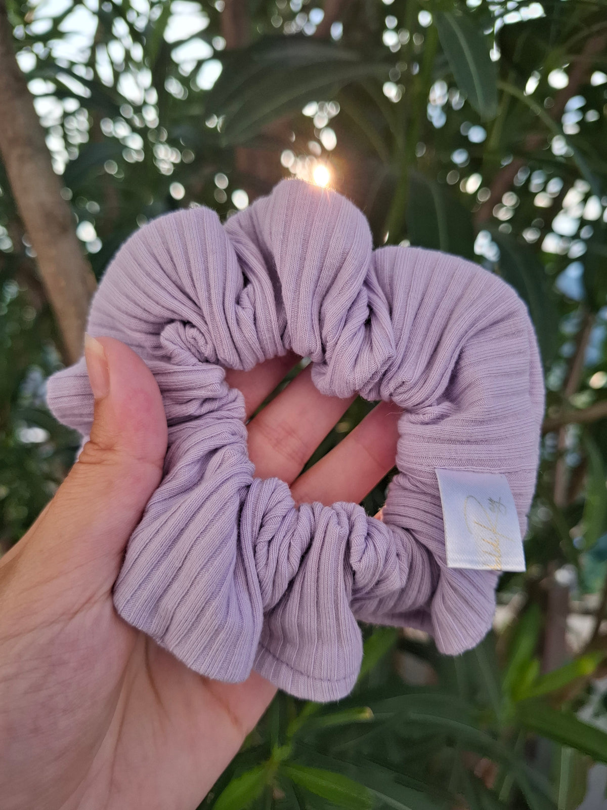 Coleteros de punto lilas