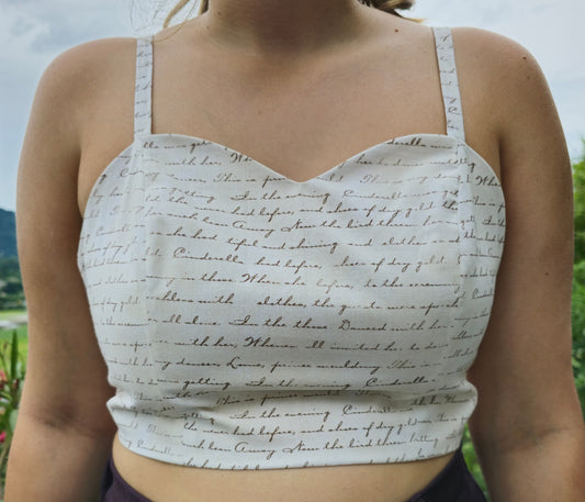 Top regolabile con scritte corsivo