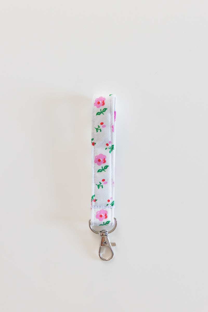 Portachiavi bianco con fiori rosa