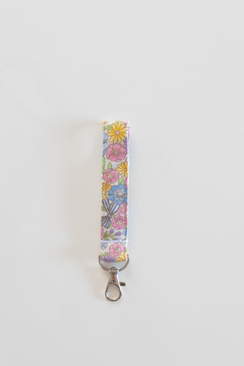 Portachiavi bianco con fiori rosa